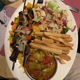 Beef Kebab dinner with loubeih, rice, fattoush and fries. Beef Kebab dinner with loubeih, rice, fattoush and fries.