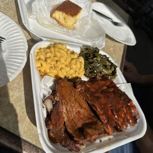 Photo of Bowlegged BBQ - San Diego, CA, United States. sampler plate with ribs, tri tip, brisket, Mac and cheese, collard greens and corn bread