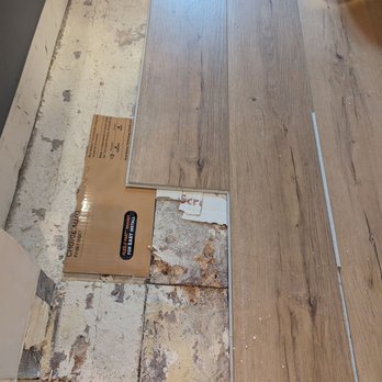 GADI Construction - Cardboard used to level the flooring, which cost multiple thousands. - General Contractors Near Me - Santa Clara, California