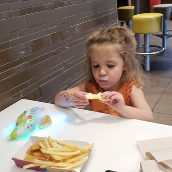 McDonald's - Eating at interactive table. - Fast Food Near Me - New Palestine, Indiana McDonald's - Eating at interactive table. - Fast Food Near Me - New Palestine, Indiana