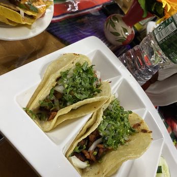 Taco Callejero - two tacos on a plate - Mexican Near Me - New York, New York Taco Callejero - two tacos on a plate - Mexican Near Me - New York, New York