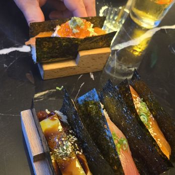 Miso Mozza - Eel, yellowtail scallion, salmon scallion, and salmon and friend handrolls - Asian Fusion Near Me - Providence, Rhode Island Miso Mozza - Eel, yellowtail scallion, salmon scallion, and salmon and friend handrolls - Asian Fusion Near Me - Providence, Rhode Island