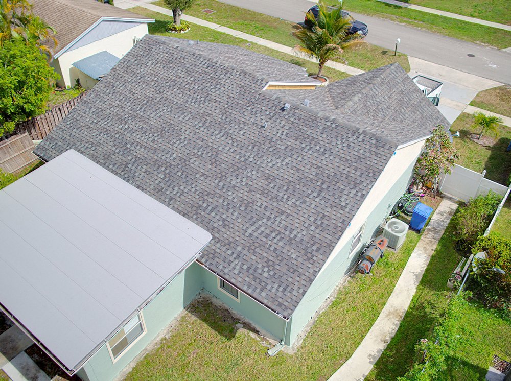 Slide of Louis Roofing