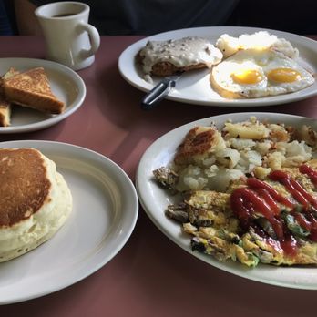 Little Corner Restaurant - Supreme omelette with hash browns and pancakes, chicken with gravy with grits and French toast - Breakfast & Brunch Near Me - Chicago, Illinois