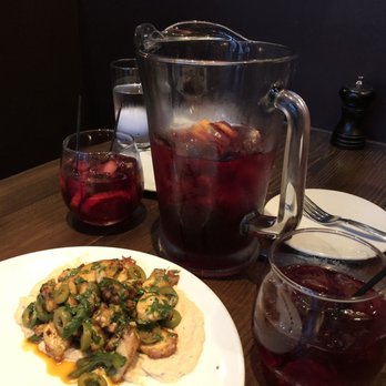 Catalan - Pitcher of sangria (serves about 4 generous glasses) with octopus starter in view. - Mediterranean Near Me - Rancho Mirage, California Catalan - Pitcher of sangria (serves about 4 generous glasses) with octopus starter in view. - Mediterranean Near Me - Rancho Mirage, California