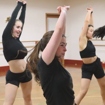 Backstage Dance Studio - Competitive dancers performing their jazz routine. - Dance Studios Near Me - Bellevue, Washington Backstage Dance Studio - Competitive dancers performing their jazz routine. - Dance Studios Near Me - Bellevue, Washington