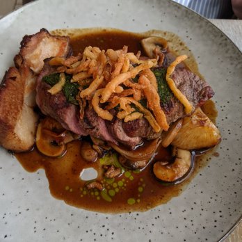 Driftwood Kitchen - FLAT IRON STEAK & PORK BELLY chimichurri sauce, roasted mushrooms, crispy red onions - Seafood Near Me - Laguna Beach, California Driftwood Kitchen - FLAT IRON STEAK & PORK BELLY chimichurri sauce, roasted mushrooms, crispy red onions - Seafood Near Me - Laguna Beach, California