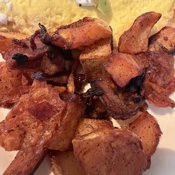 The Cheesecake Factory - These potatoes were greasy and inedible. - Desserts Near Me - Miami Beach, Florida