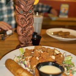 Oriental chicken salad and the passionfruit Mia Tia in a traditional tiki mug.