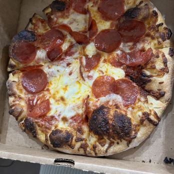 Sid's Pizza - This is the owner's idea of extra crispy?  He was the cook the night I was there - Pizza Near Me - Alpharetta, Georgia