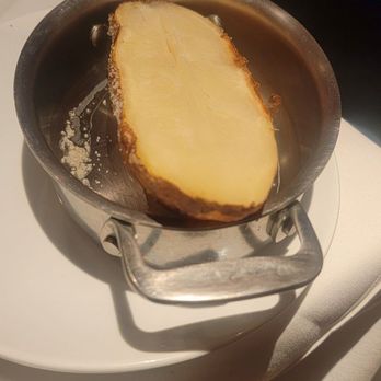 Fleming’s - 1/2 baked potato - Steakhouses Near Me - Orlando, Florida Fleming’s - 1/2 baked potato - Steakhouses Near Me - Orlando, Florida