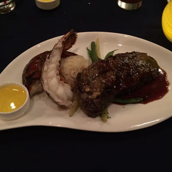 Narcoossee's - Steak and lobster tail pairing. - New American Near Me - Lake Buena Vista, Florida Narcoossee's - Steak and lobster tail pairing. - New American Near Me - Lake Buena Vista, Florida