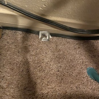 Cedar Breaks Lodge by Diamond Resorts - Wrapper on the floor behind the trash can. - Hotels Near Me - Brian Head, Utah
