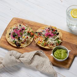 Familia Fine Foods - Authentic Mexican flavors await! Enjoy our delicious Tacos, made with fresh tortillas and your choice of fillings like marinated chicken, se