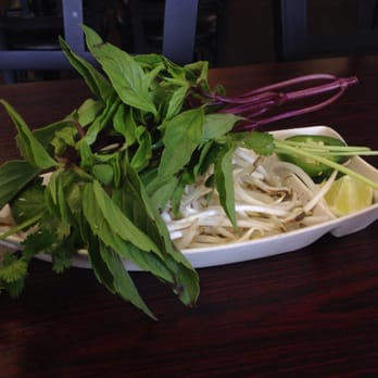 Pho Saigon - No, this isn't a side salad. This is a plate of all the toppings you can add to your pho! - Vietnamese Near Me - Lexington, Kentucky Pho Saigon - No, this isn't a side salad. This is a plate of all the toppings you can add to your pho! - Vietnamese Near Me - Lexington, Kentucky
