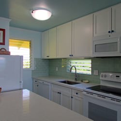 Kapaa Sands - Oceanfront Unit 9 Kitchen... Love this kitchen - from the glass tiles to the SPA colors... so serene!! Hulanow.com