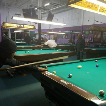 Quball 1 - people playing pool in a game room - Pool Halls Near Me - Capitol Heights, Maryland Quball 1 - people playing pool in a game room - Pool Halls Near Me - Capitol Heights, Maryland