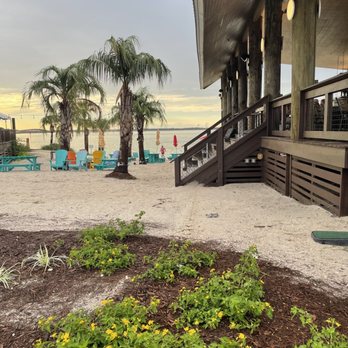 Water Pig BBQ - There is ample covered outdoor seating and some waterfront seating on the beach - Barbeque Near Me - Pensacola Beach, Florida Water Pig BBQ - There is ample covered outdoor seating and some waterfront seating on the beach - Barbeque Near Me - Pensacola Beach, Florida