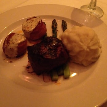 Hy's Steak House - Petit filet, bacon wrapped scallops with garlic mashed potatoes and asparagus. The picture does not do it justice. - Steakhouses Near Me - Honolulu, Hawaii