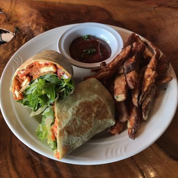 ION Restaurant, It's Only Natural, ION - Buffalo tofu wrap with a side of their famous sweet potato fries. - Vegan Near Me - Middletown, Connecticut ION Restaurant, It's Only Natural, ION - Buffalo tofu wrap with a side of their famous sweet potato fries. - Vegan Near Me - Middletown, Connecticut
