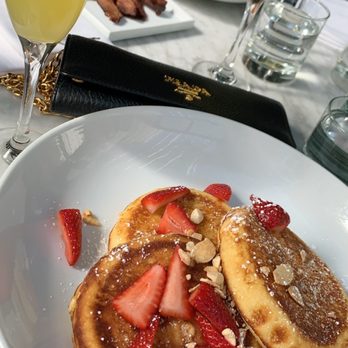 Ysabel - Buttermilk pancakes, thin sliced bacon and of course mimosas what is brunch without mimosas - New American Near Me - West Hollywood, California Ysabel - Buttermilk pancakes, thin sliced bacon and of course mimosas what is brunch without mimosas - New American Near Me - West Hollywood, California