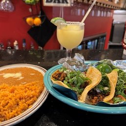 More delicious chorizo tacos on Cinco De Mayo. The beans and rice is so good too. More delicious chorizo tacos on Cinco De Mayo. The beans and rice is so good too.