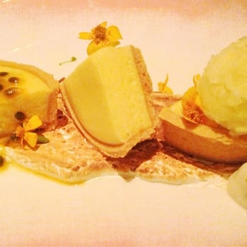 1919 Restaurant - Passion fruit tart over a bed of soft meringue. So good. So good. - New American Near Me - San Juan, Puerto Rico 1919 Restaurant - Passion fruit tart over a bed of soft meringue. So good. So good. - New American Near Me - San Juan, Puerto Rico