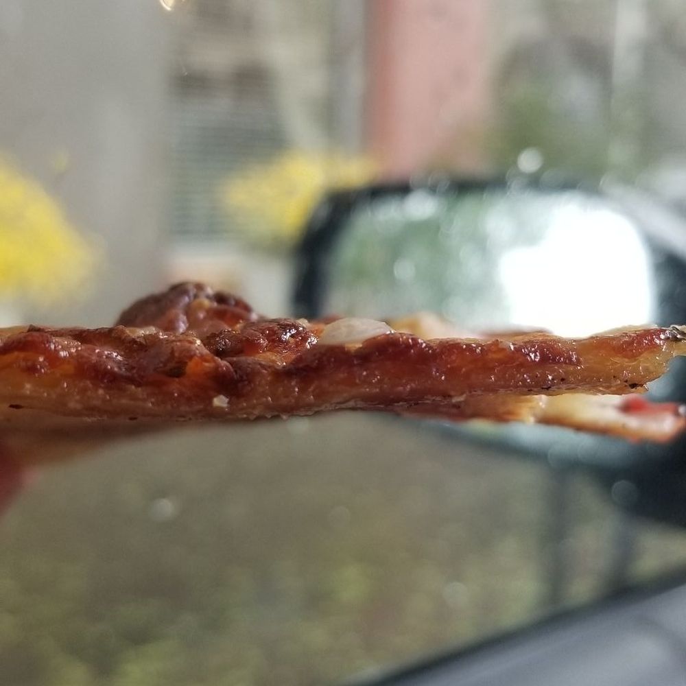 Horrible old slice not even 1/4 inch thick. Gross. Horrible old slice not even 1/4 inch thick. Gross.