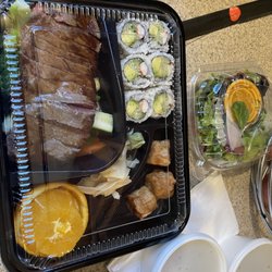 Saga Fusion - Beef teriyaki Bento Box done medium rare with soup, rice and salad.