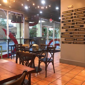 La Bambina Pizza - tables and chairs in a restaurant - Pizza Near Me - Hialeah, Florida La Bambina Pizza - tables and chairs in a restaurant - Pizza Near Me - Hialeah, Florida