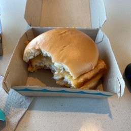 a half eaten sandwich in a box a half eaten sandwich in a box
