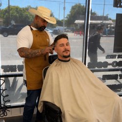 Getting a fade and comb over by Dave