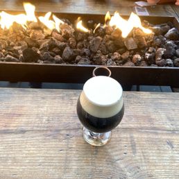 Enjoying a Darker Persuasion Carmel Macchiato on the patio 9 ABV and a fire keeping us warm!