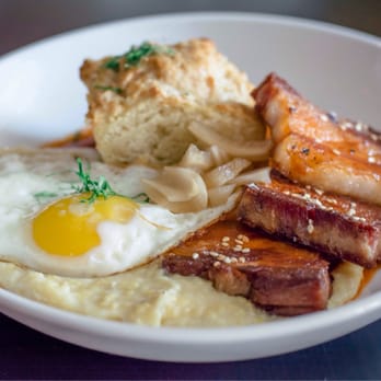 Bardot Cafe - bacon, eggs, and grits on a plate - Cocktail Bars Near Me - Philadelphia, Pennsylvania Bardot Cafe - bacon, eggs, and grits on a plate - Cocktail Bars Near Me - Philadelphia, Pennsylvania