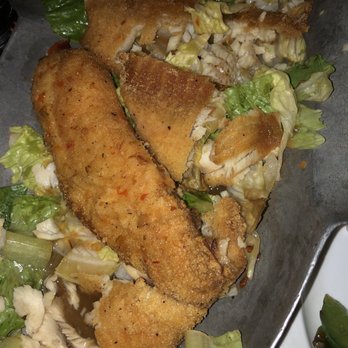 Sea Thai - Not expecting the Tilapia to be this. The breaking of the pieces is us eating before remembering to take a pict not how they served it - Thai Near Me - Brooklyn, New York Sea Thai - Not expecting the Tilapia to be this. The breaking of the pieces is us eating before remembering to take a pict not how they served it - Thai Near Me - Brooklyn, New York