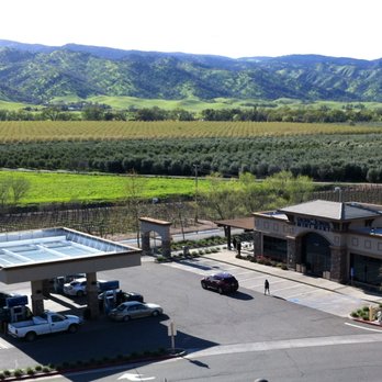 Cache Creek Mini Mart - Gas pumps; Arch to the drive-thru carwash; Patio; Convenience store with clean restrooms - Gas Stations Near Me - Brooks, California