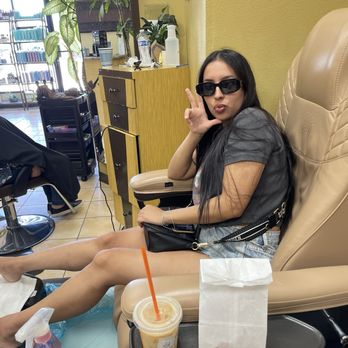 Studio MG Salon - Mariah taking a quick pose while getting her pedi - Hair Salons Near Me - Chula Vista, California
