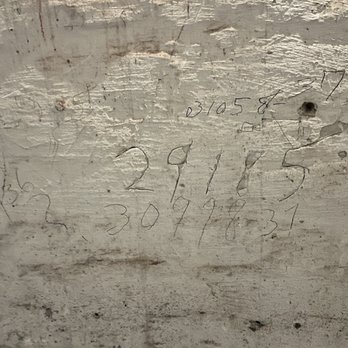 The Ohio State Reformatory - This cell wall still shows the carvings inmates did when they were prisoners. - Museums Near Me - Mansfield, Ohio The Ohio State Reformatory - This cell wall still shows the carvings inmates did when they were prisoners. - Museums Near Me - Mansfield, Ohio