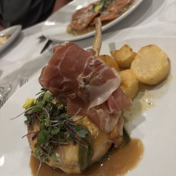 Pulcinella Ristorante - Costata di Maiale (pork chop with smoked mozzarella & prosciutto) side of sauted spinach and potatoes - Italian Near Me - Thousand Oaks, California Pulcinella Ristorante - Costata di Maiale (pork chop with smoked mozzarella & prosciutto) side of sauted spinach and potatoes - Italian Near Me - Thousand Oaks, California
