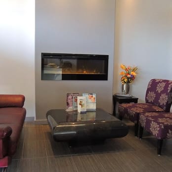 Teal - TEAL's reception, cozy with an elegant fire place. - Massage Near Me - Ottawa, Ontario
