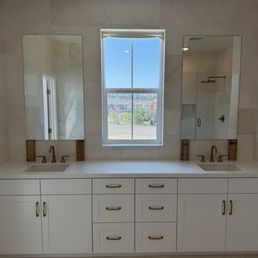 Master bathroom custom mirrors on marble wall