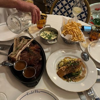 Poulet Bleu - Ribeye for 2 with bone marrow; Salmon entree; Pomme Frites; Aligot potatoes. - French Near Me - Pittsburgh, Pennsylvania