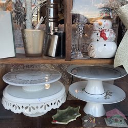The Worthy Pause - White dessert plates on pedestals save room on your dessert table by placing flat dessert dishes underneath them. $5 each