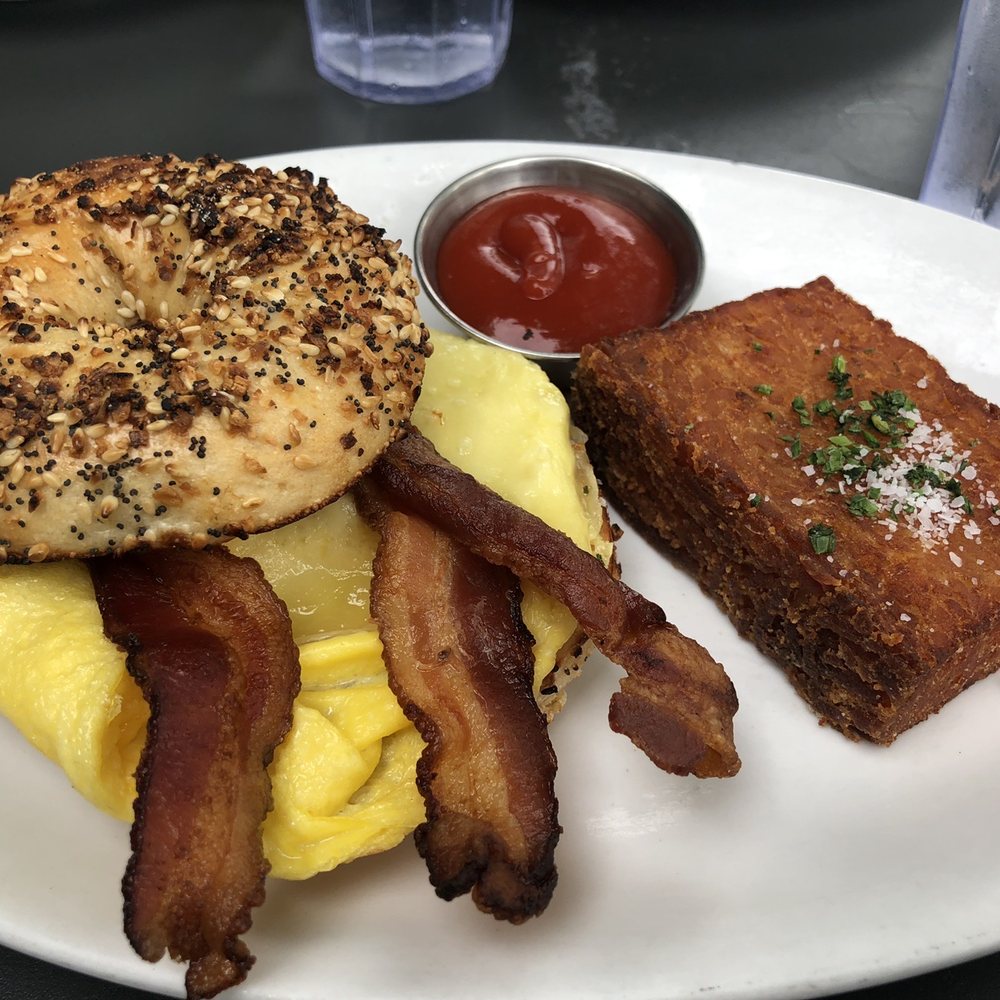 Open City - Bacon, egg & cheese bagel with a hash brown - American Near Me - Washington, DC, District of Columbia Open City - Bacon, egg & cheese bagel with a hash brown - American Near Me - Washington, DC, District of Columbia