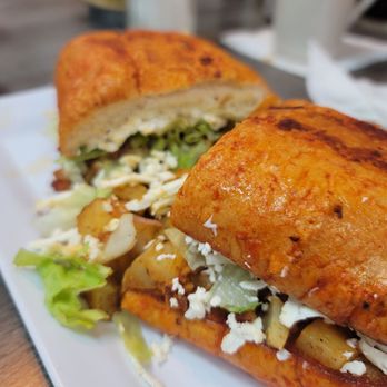 Fonda Maria - a sandwich on a white plate - Mexican Near Me - Downey, California Fonda Maria - a sandwich on a white plate - Mexican Near Me - Downey, California