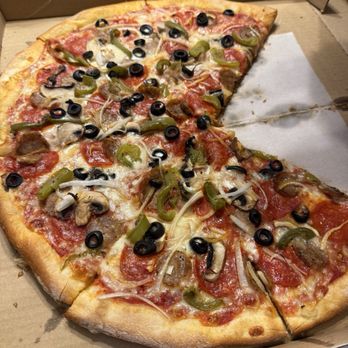 Pizzeria Tona - Large  Supreme Pizza , partially eaten prior to the review haha - Pizza Near Me - Las Vegas, Nevada