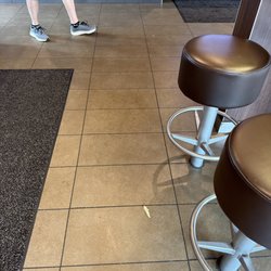 McDonald's - Fries and trash all over the floor.