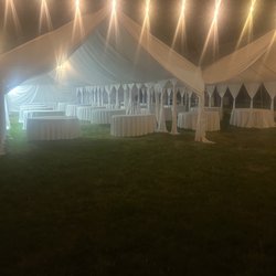 MJ Magical Events - Tent with draping liens tables and chairs