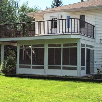 Ideal Sundecks - Three season sunroom enclosure under walkout upper deck. - Patio Coverings Near Me - Edmonton, Alberta