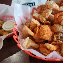 Ben's Bar - Fresh made pork rinds, they have 3 different seasonings you can add- so delish! My fiance loves the hot pepper cheese cubes as well.